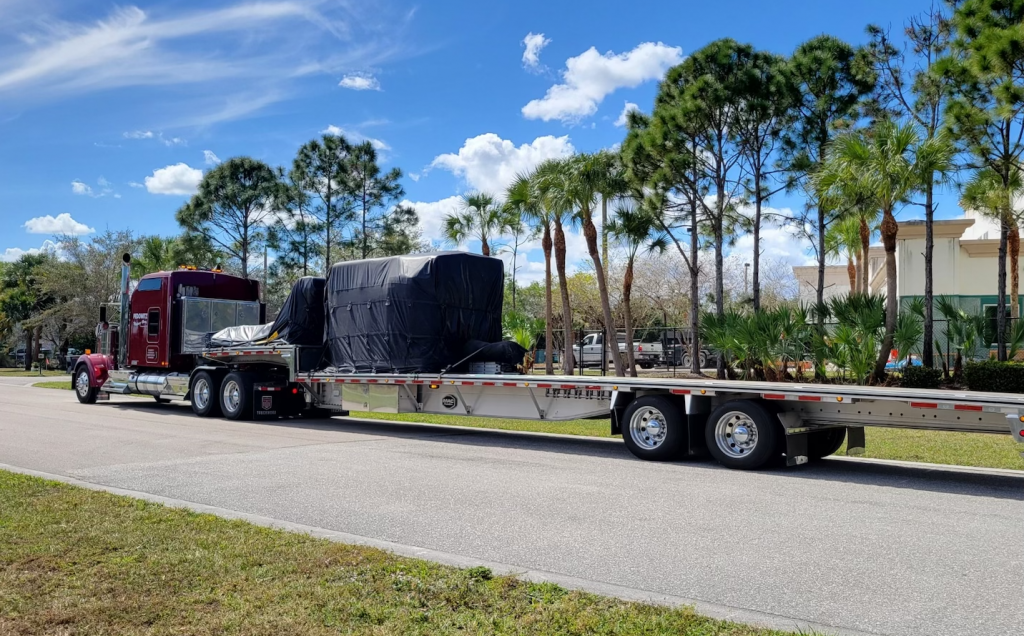 Pedowitz-Machinery-Movers-Carolina-CNC-Lathe-Trucking-and-Rigging-Jupiter-Florida-to-California-1