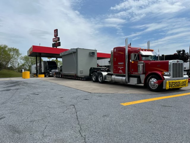 Pedowitz Machinery Movers Charlotte Carolina Trucking Rigging Company Oversize Load Transport Chemical Hut from Wilksboro NC to Columbus GA